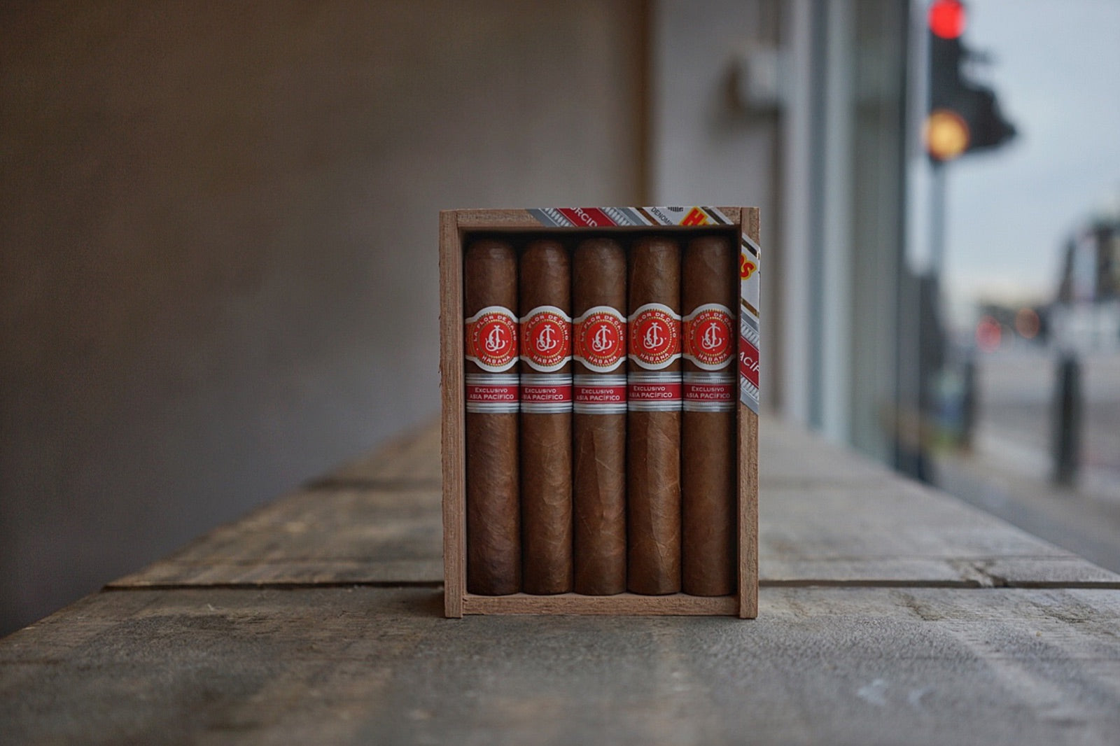 Open box of Cuban robusto cigars standing upright, showing the short thick robusto cigar format